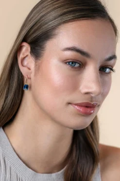 25mm ZINZI gold plated zilveren oorhangers met indigo blauwe kleursteen in vierpootszetting ZIO2578