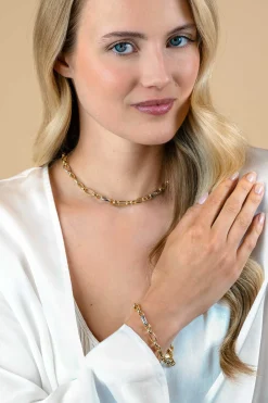ZINZI bicolor schakelarmband (7mm breed) met afwisselend gold plated jasseron schakels en grote zilveren ovale schakels 19cm ZIA2639