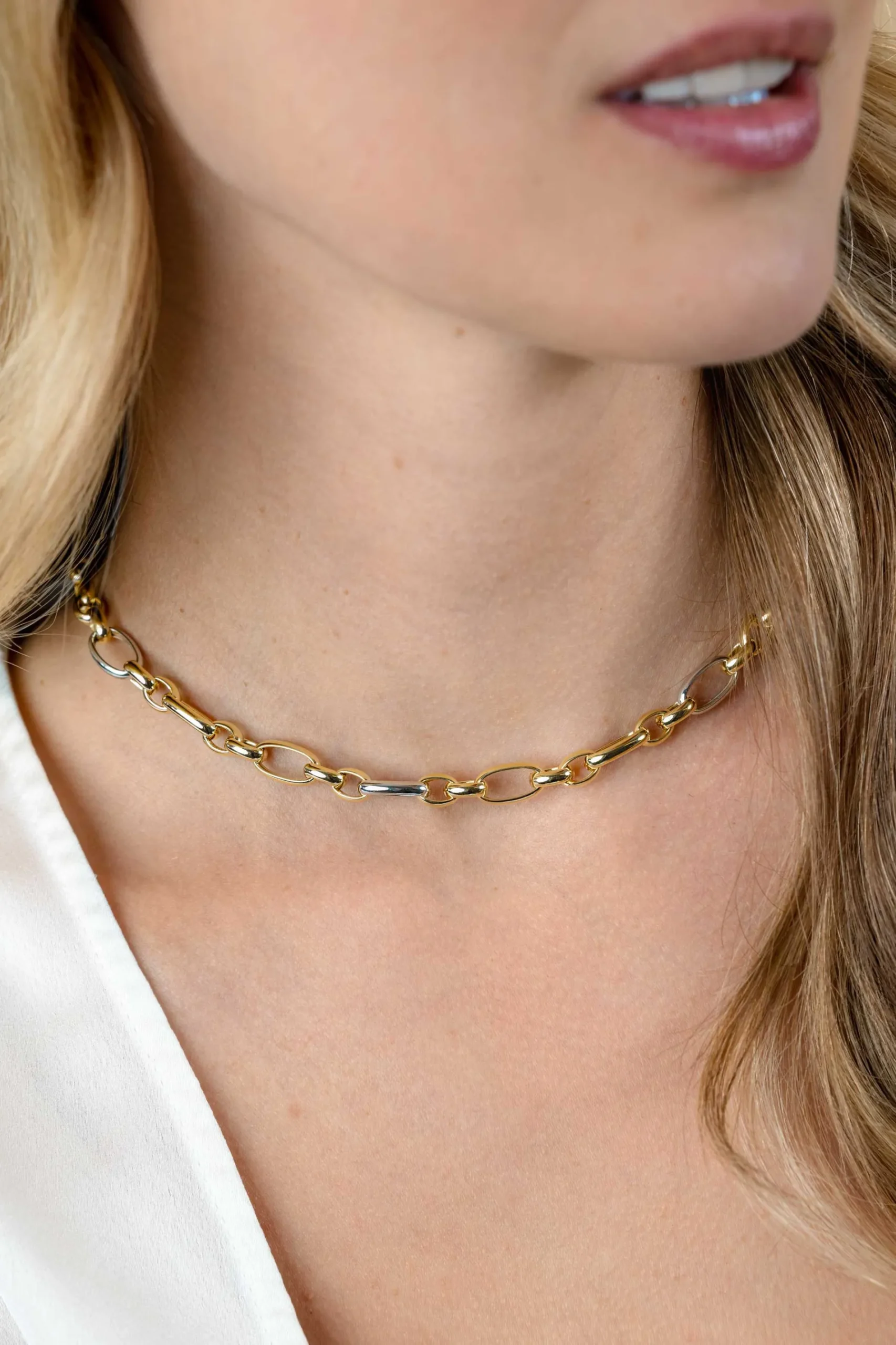 ZINZI bicolor schakelketting (7mm breed) met afwisselend gold plated jasseron schakels en grote zilveren ovale schakels 45cm ZIC2639