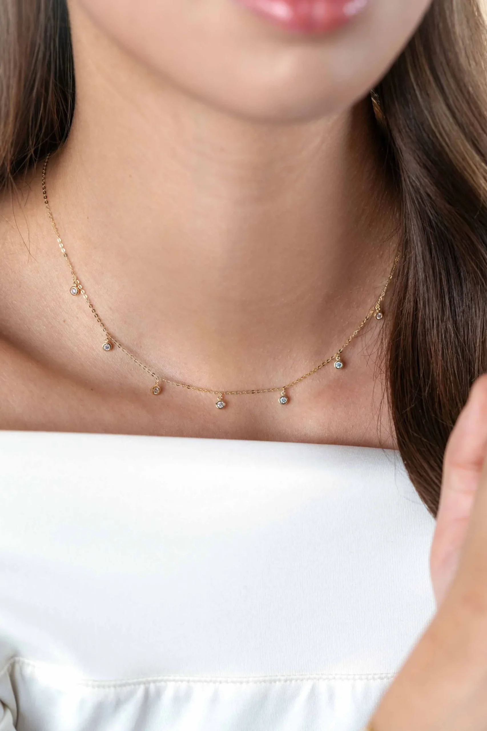ZINZI Gold 14 krt gouden anker ketting met zeven ronde hangertjes, bezet met witte zirconia's 40-43cm ZGC451
