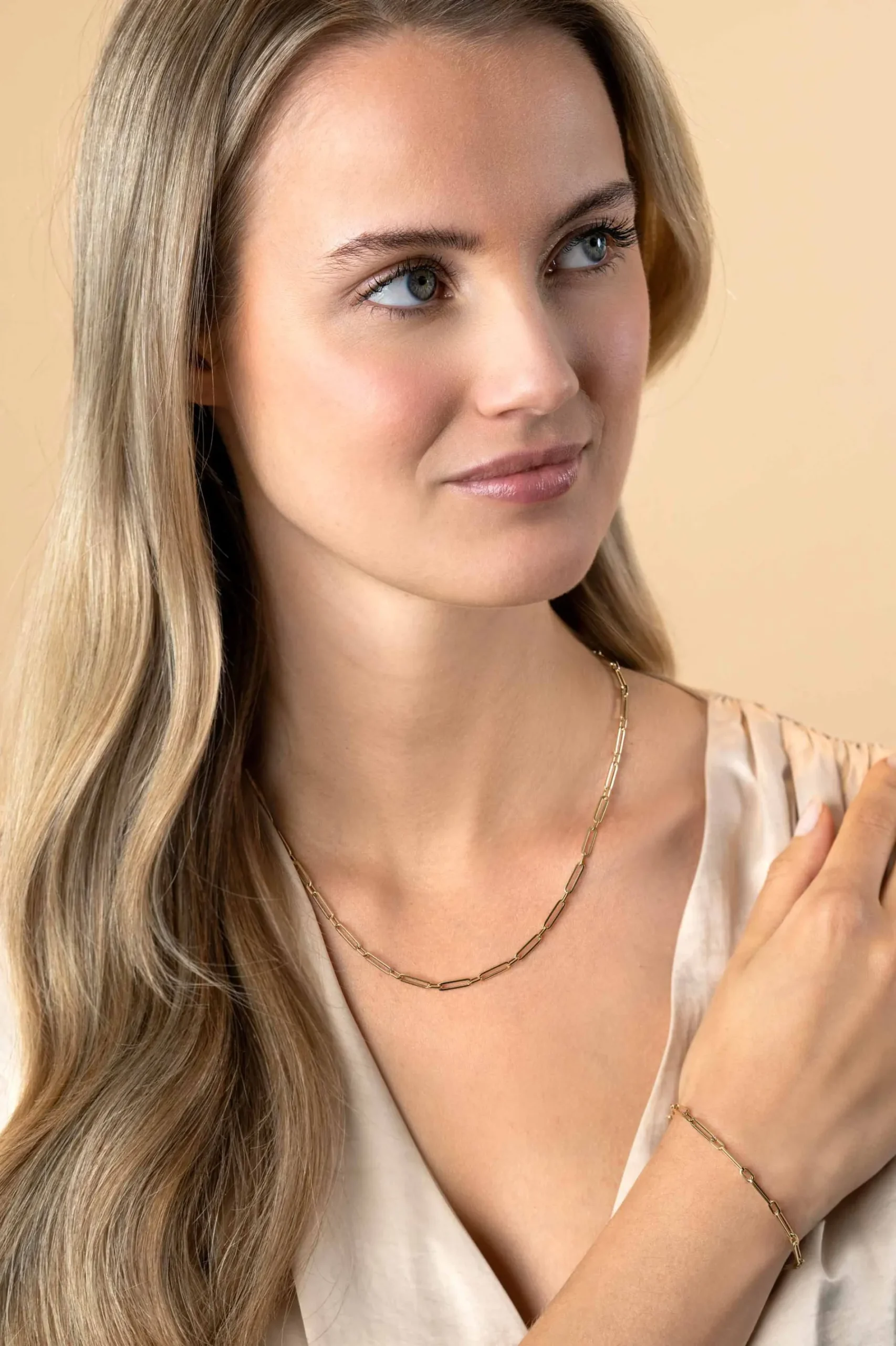 ZINZI Gold 14 krt gouden armband met trendy paperclip/closed for ever schakels met tussenoog 3mm breed, lengte 19cm ZGA470
