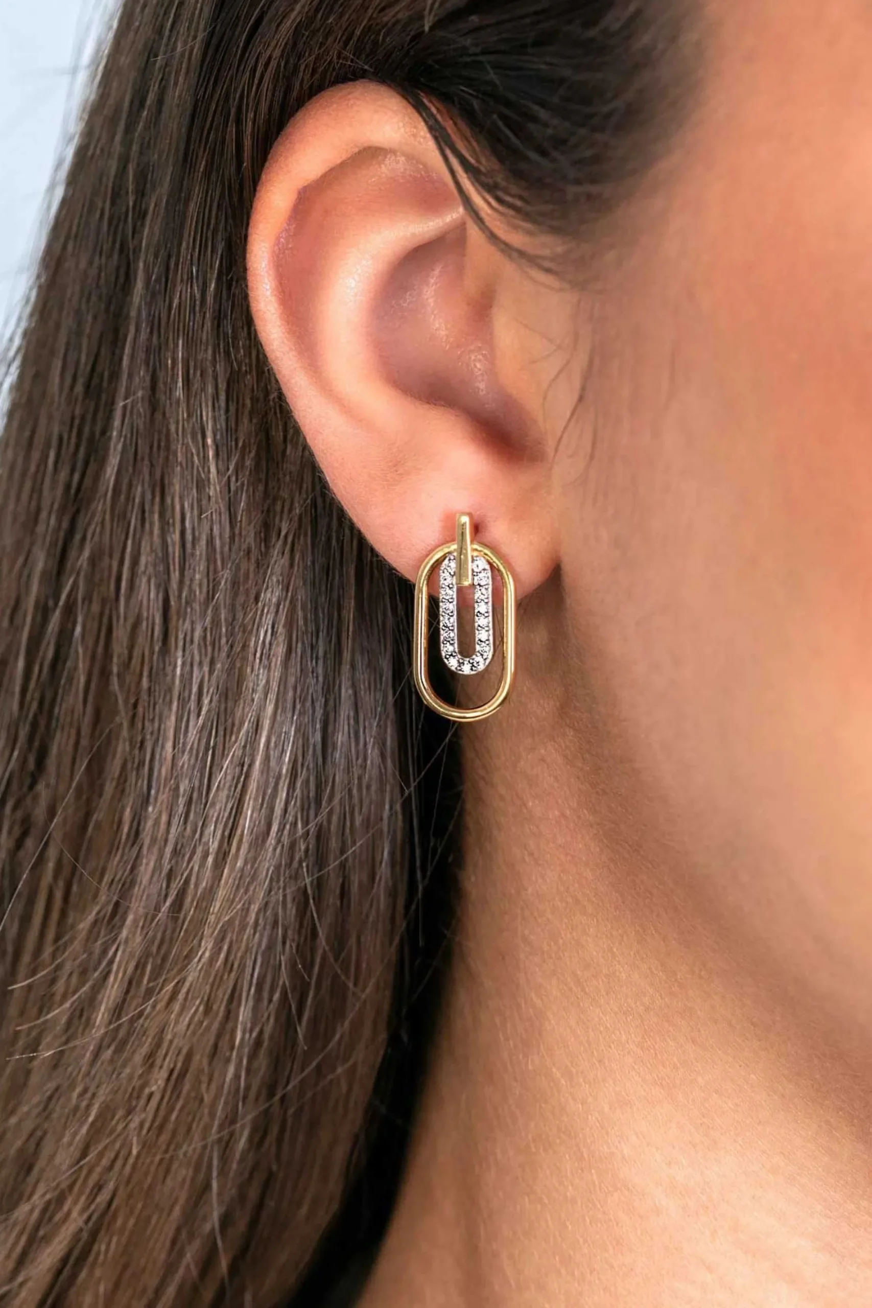ZINZI gold plated zilveren ovale oorstekers 20mm bezet met witte zirconia's ZIO2329
