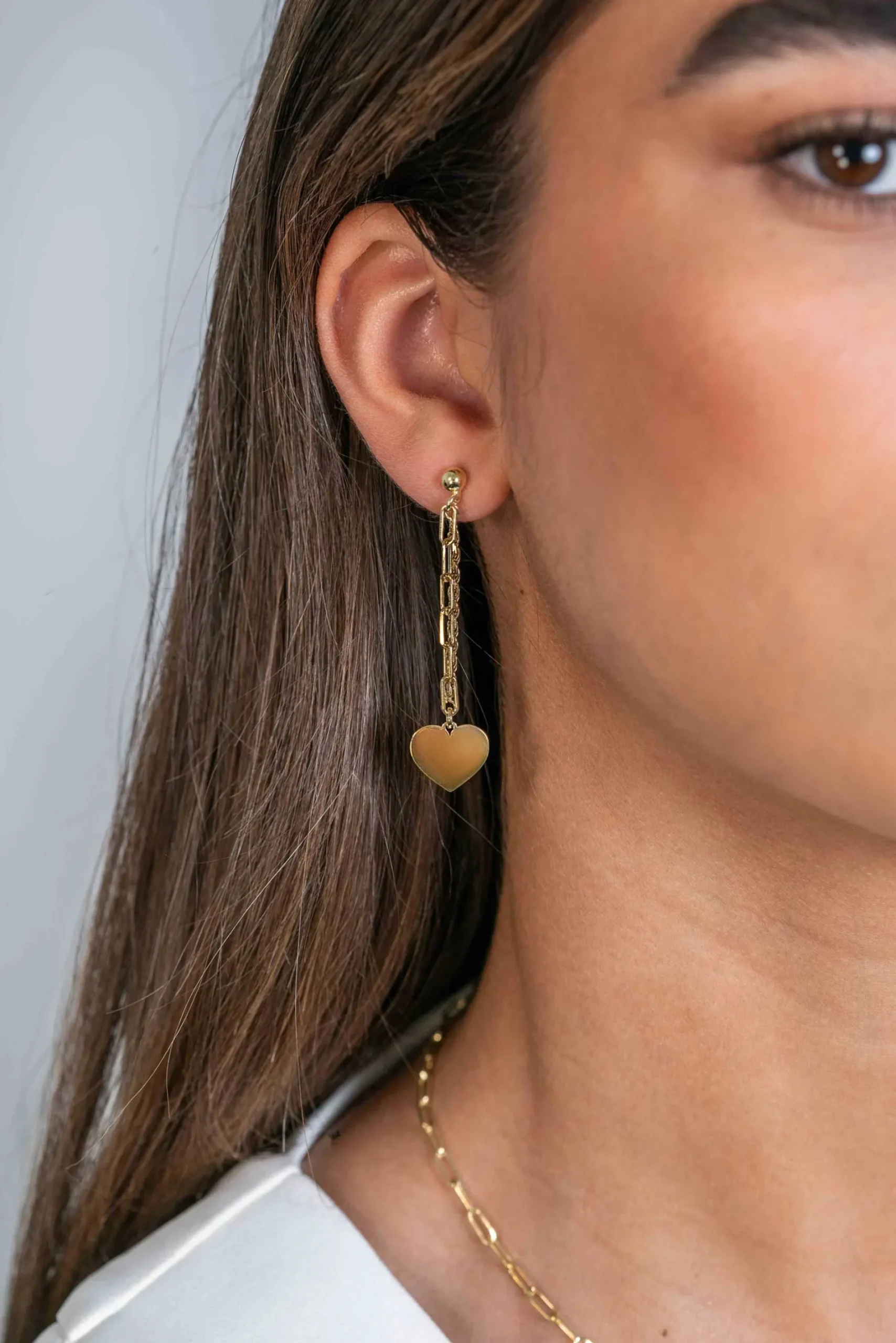 ZINZI gold plated zilveren oorstekers 52mm lang met twee trendy schakels en glad hart ZIO2381G