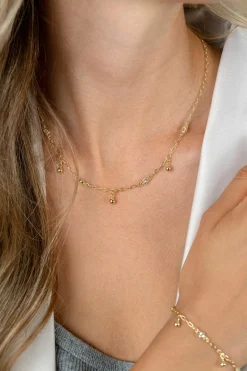 ZINZI gold plated zilveren schakelketting met vier witte zirkonia's en 3 ronde bolletjes, gelijkmatig verdeeld over de ketting 42-45cm ZIC2658