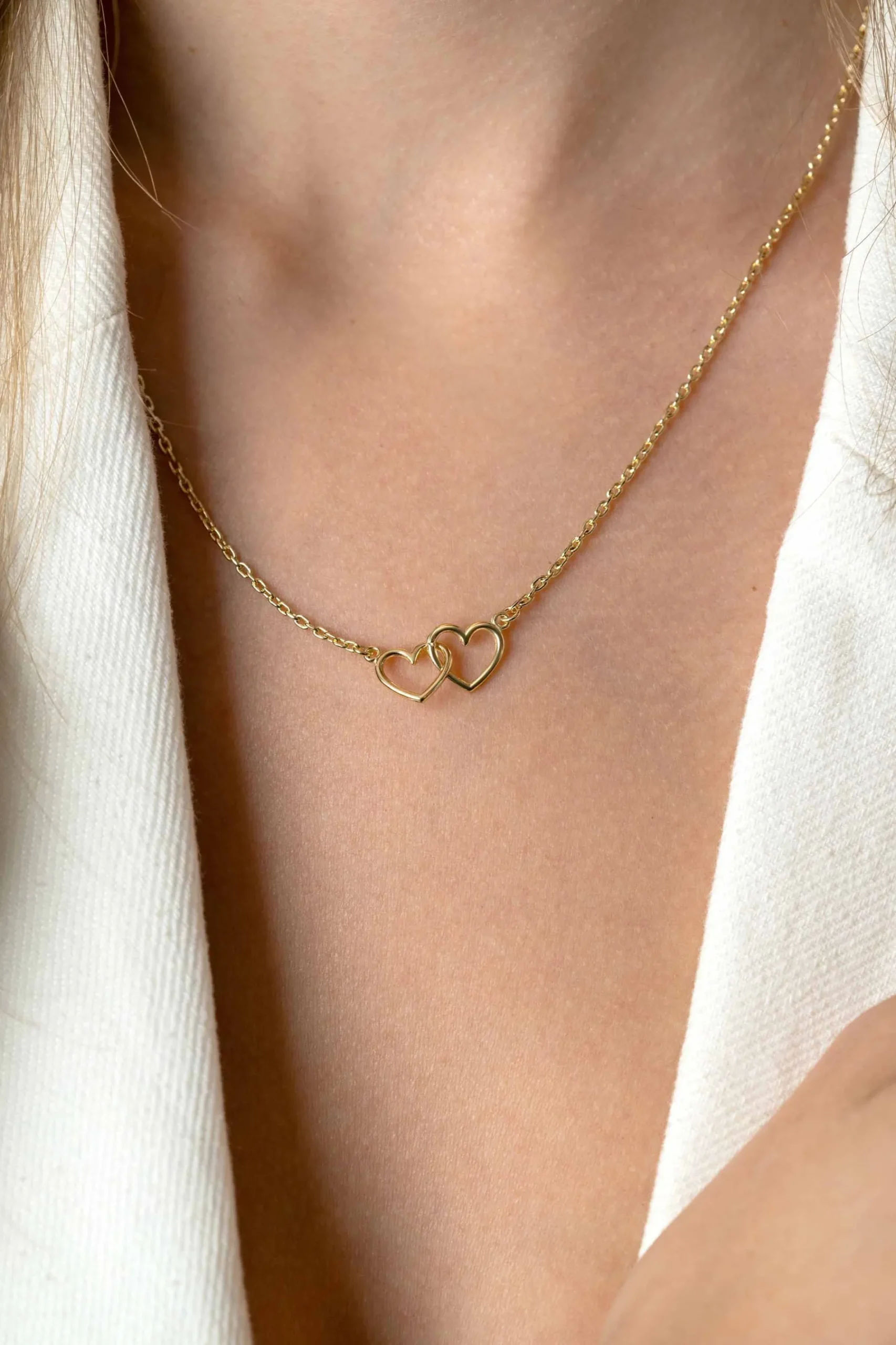 ZINZI gold plated zilveren ketting met 2 verbonden hartjes 40-45cm ZIC2513G