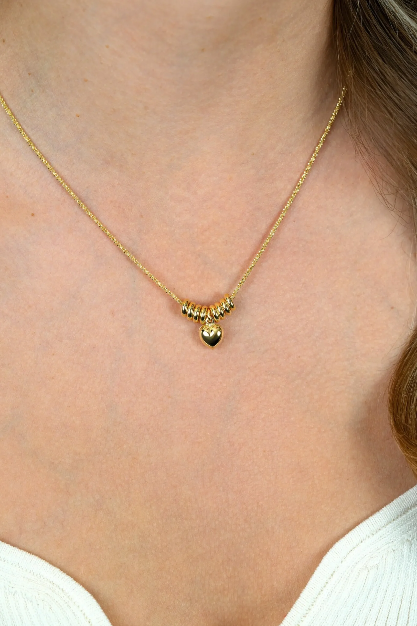 ZINZI gold plated zilveren ketting 42-45cm met hart en 8 glanzende donuts ZIC2760