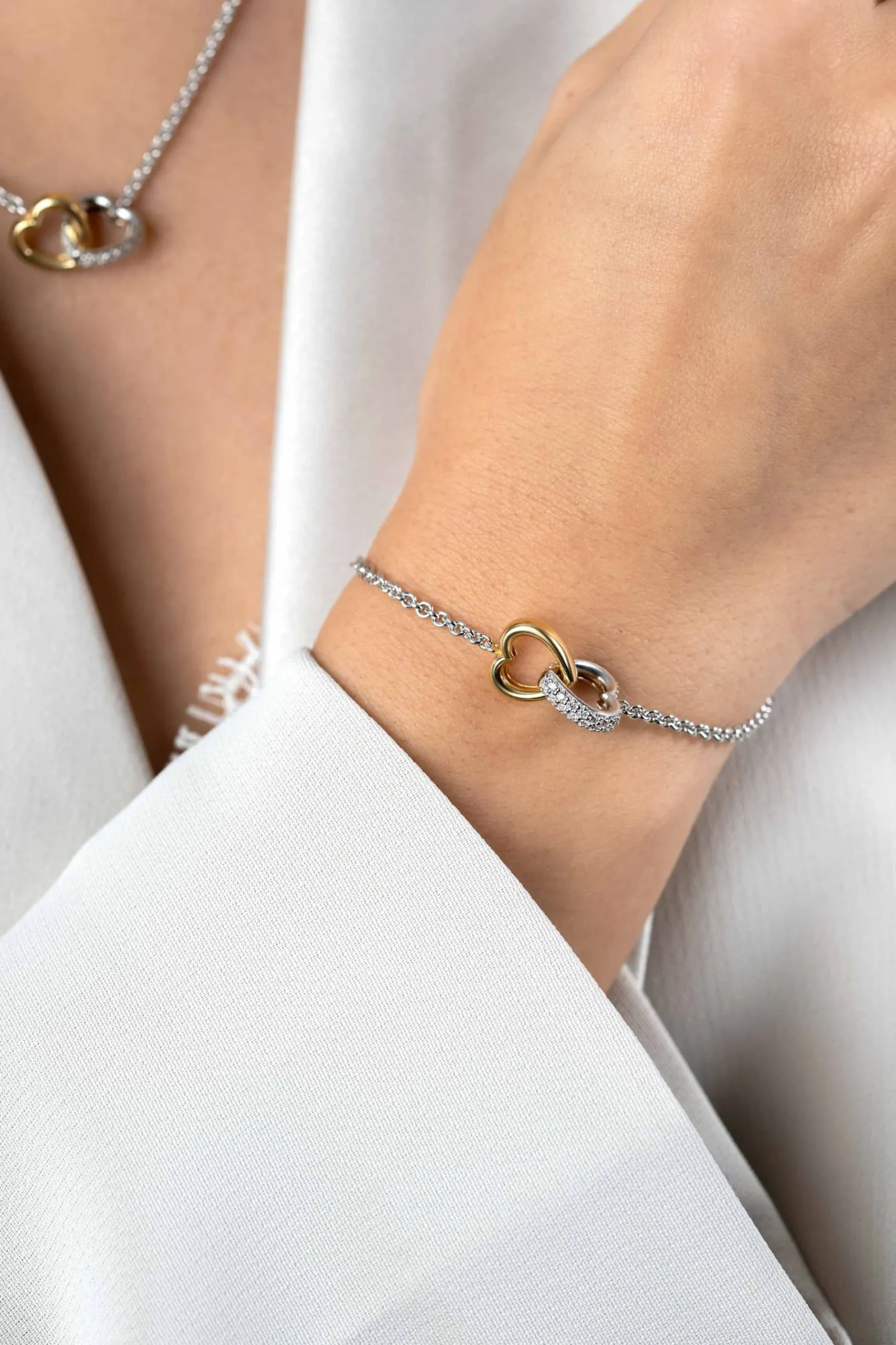 ZINZI zilveren armband bicolor schakel met twee harten verbonden 17-20cm ZIA2276