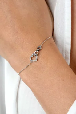 ZINZI zilveren armband met Infinity teken verbonden met een open hart, bezet met witte zirconia's 17-19cm ZIA2596