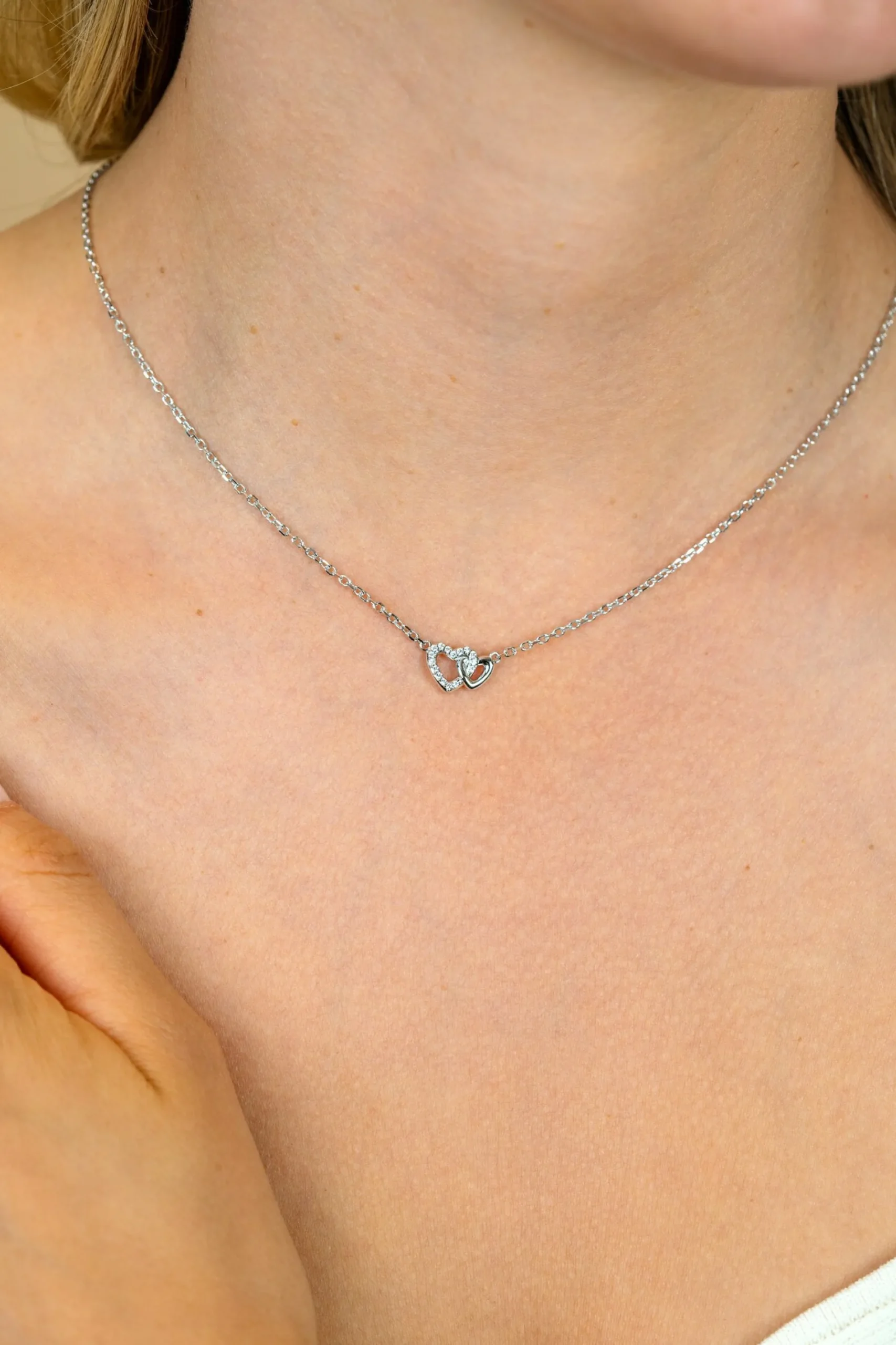 ZINZI zilveren ketting 42–45cm met verbonden hartjes, witte zirkonia's ZIC2493