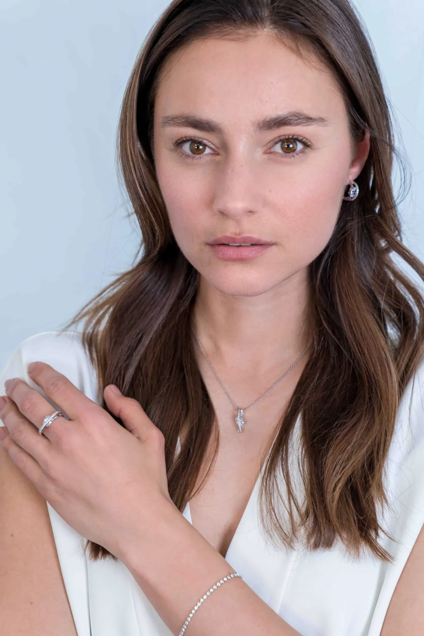 ZINZI zilveren luxe cross-over ring ovale witte zirconia ZIR2190