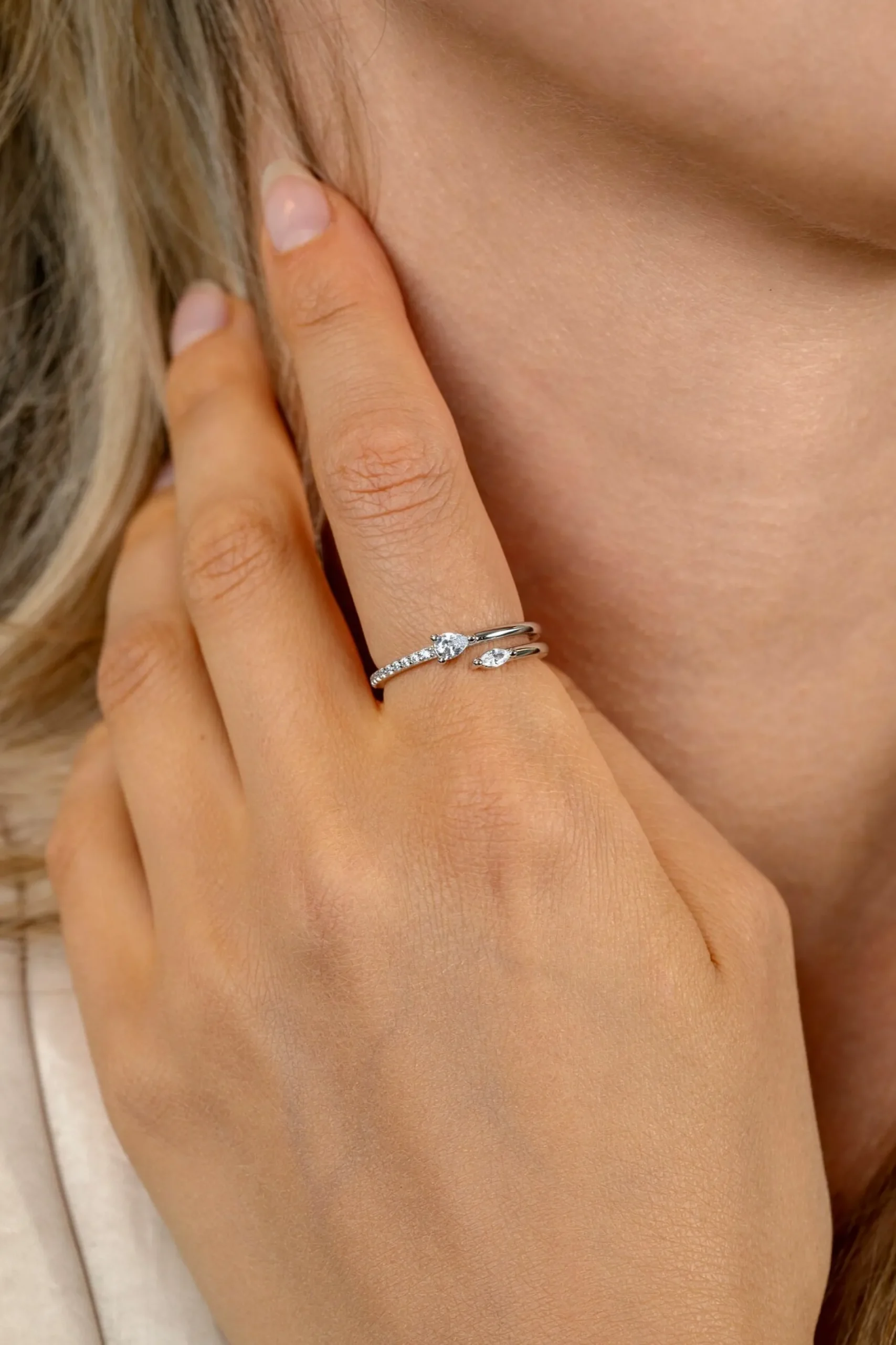 ZINZI zilveren multi-look ring (4mm breed) met een peervormige en ovale witte zirkonia ZIR2689