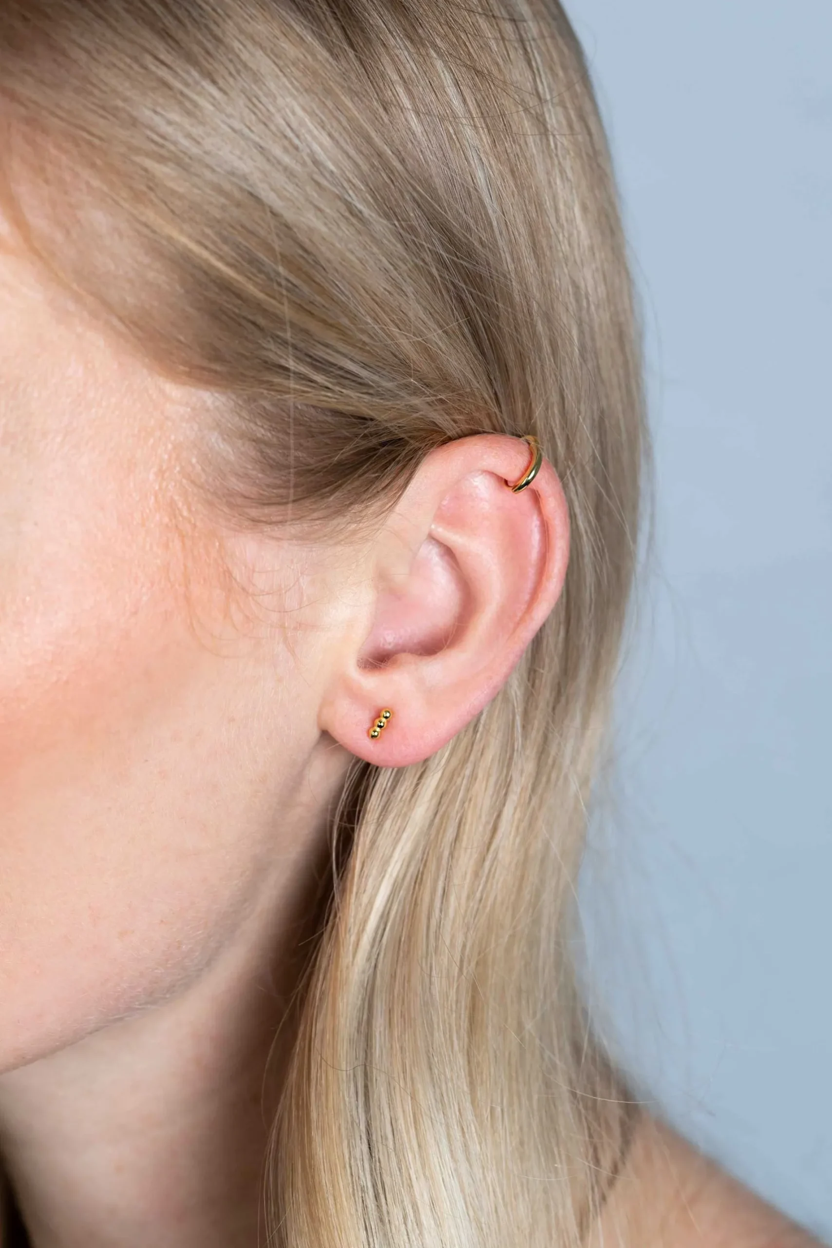 ZINZI zilveren oorknoppen 14K geelverguld drie bolletjes 6mm ZIO2230G