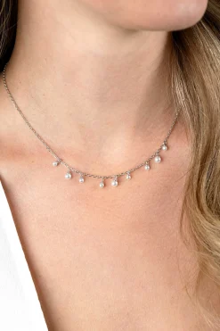 ZINZI zilveren schakelketting met negen ronde witte glasparels in verschillende groottes, speels verdeeld over de ketting 40-45cm ZIC2623